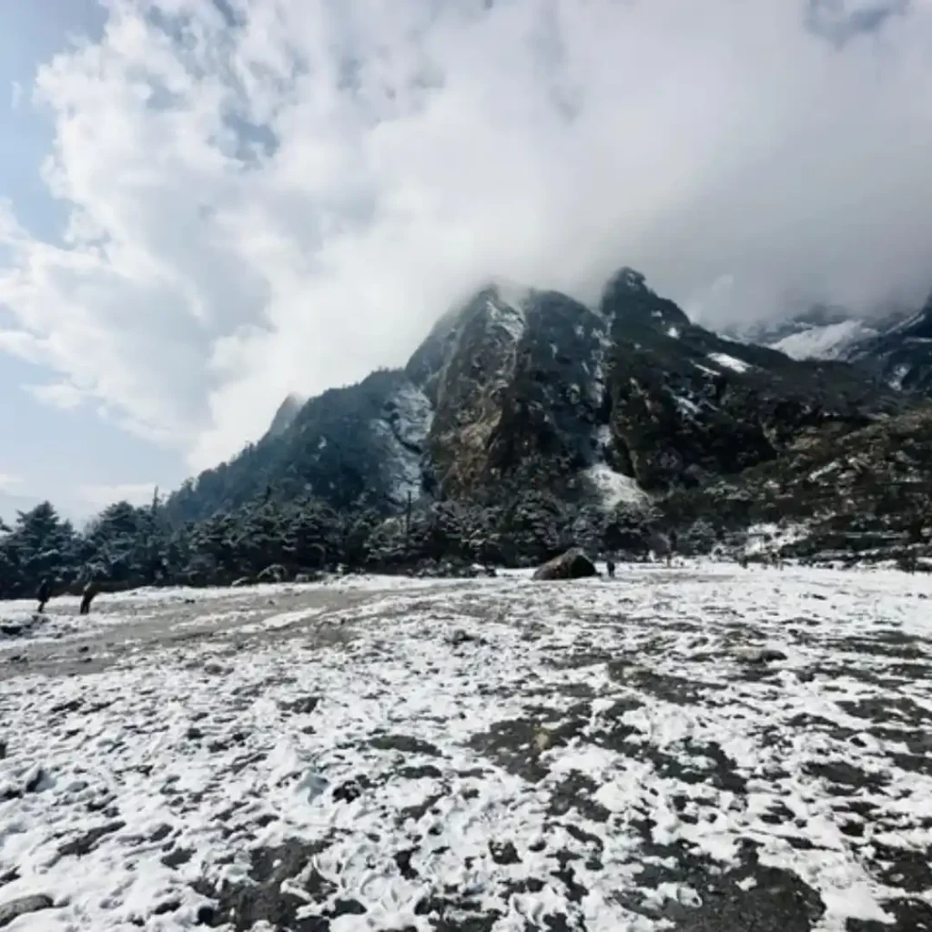 How to Reach Lachung: By Road, Train & Flight 5 Lachung covered with a beautiful mountain with snow