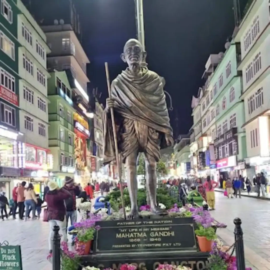 Gangtok Travel Guide 2025: Best Time, Activities, Places & How to Reach 6 GangtokMG marg, with a statue of Mahatma Gandhi