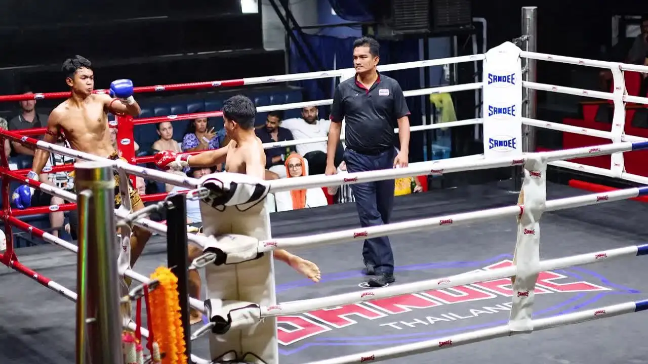 Muay Thai Competitors in a Boxing Ring