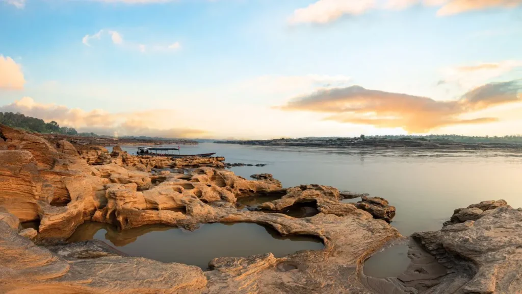 Sunrise landscape photo with boat, mountain, Sam Phan Bok, Ubon Ratchathani, Thailand