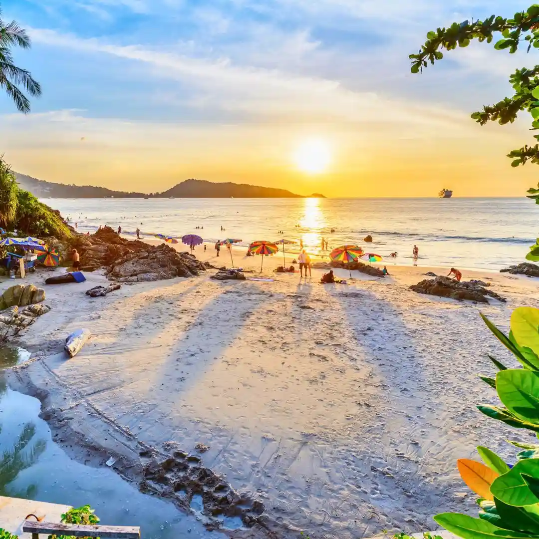 Watch sunset from a rooftop bar in Thailand