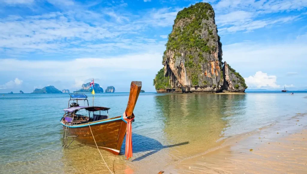 Take a longtail boat to Railay Beach